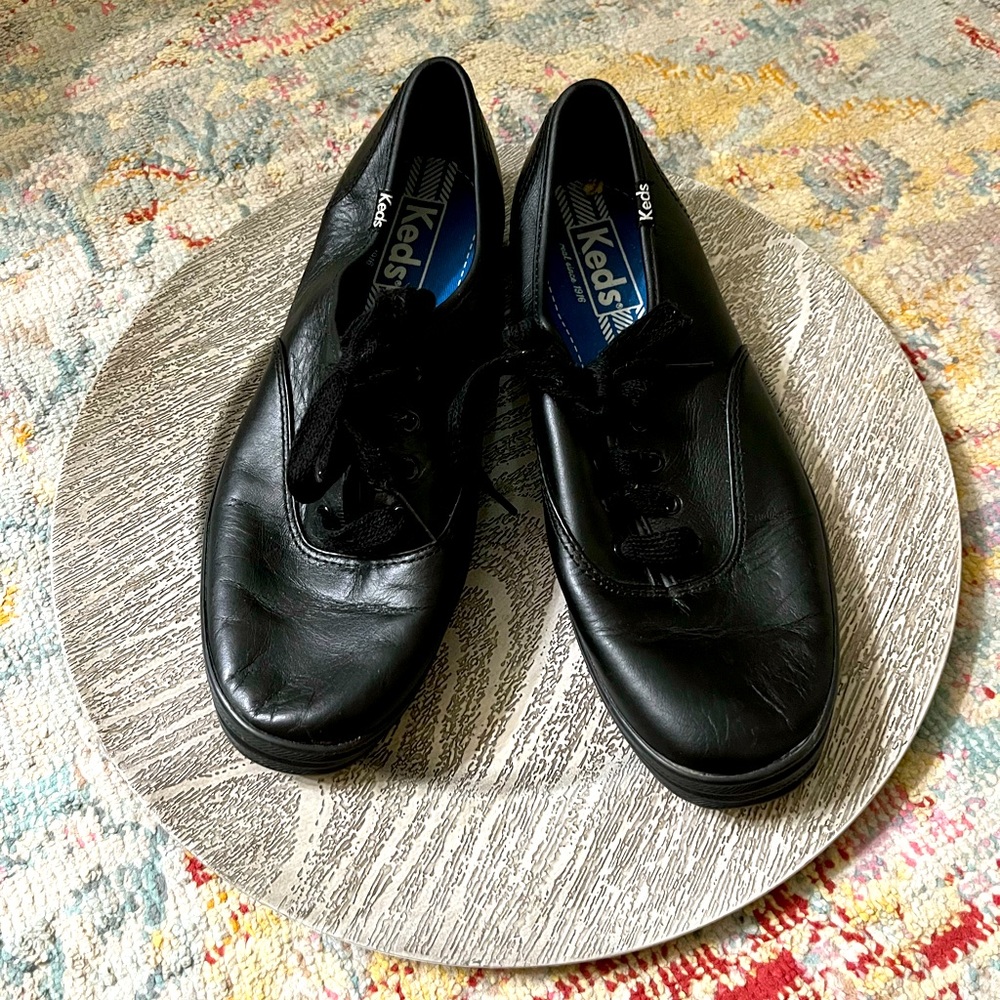 Black leather keds like new not sure if ever worn.